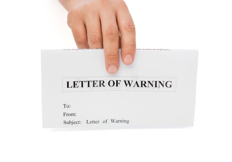 Man's hand holding a letter of warning royalty free stock photos