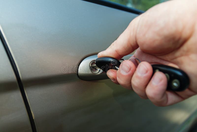 Man S Hand Opens the Car Door with a Key Stock Photo Image of lock