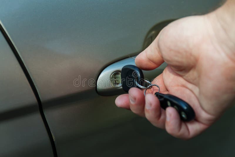 Man S Hand Opens the Car Door with a Key Stock Photo Image of hand