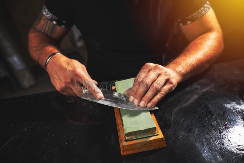 Man`s Hands Sharpening Knife Stock Photo Image of grindstone