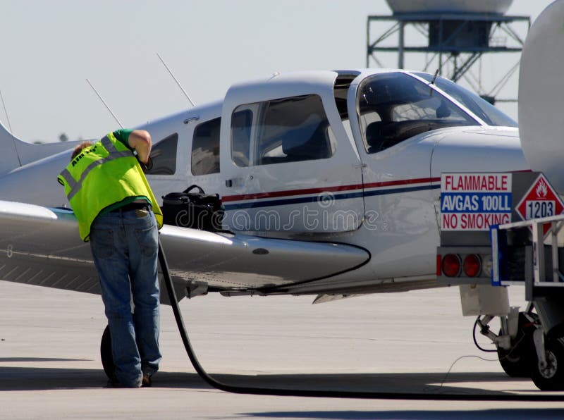 Fueling the aircraft stock photo. Image of storm, kota - 20516640