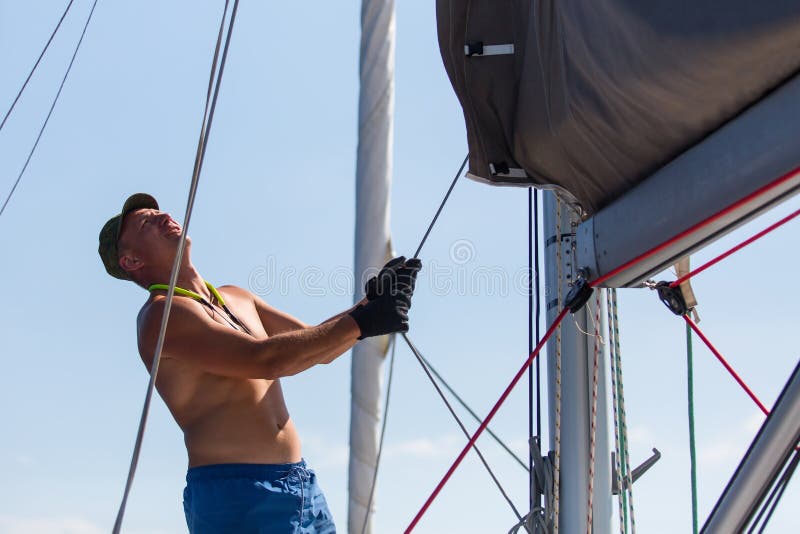 Man on the Sailing Yacht Boat. Sport. Stock Photo Image of summer