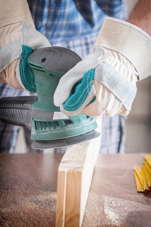 Man Sanding a Wood with Orbital Sander Stock Image Image of grinder