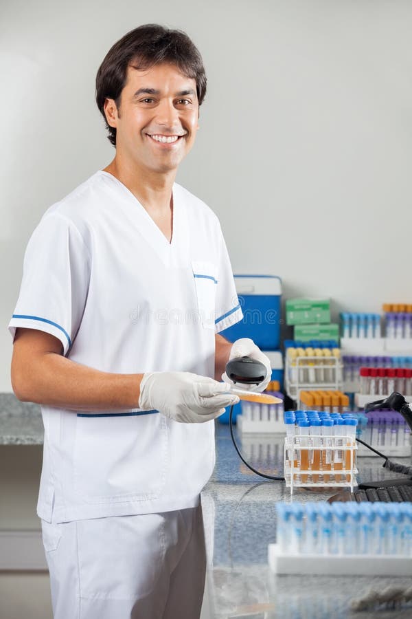 Man Scanning Medical Sample in Laboratory Stock Image Image of
