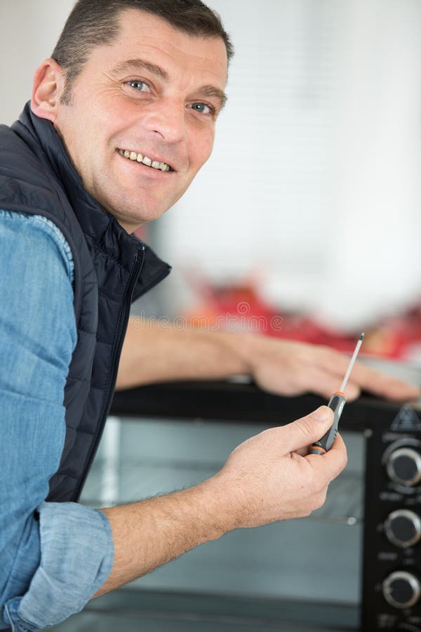 1,442 Oven Repairman Stock Photos Free & RoyaltyFree Stock Photos
