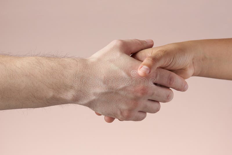 Man shaking woman`s hand stock photos Man shaking woman`s hand stock photos
