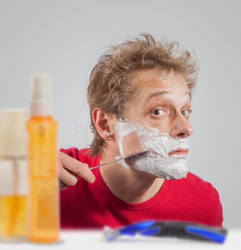 Man with shaving cream. 