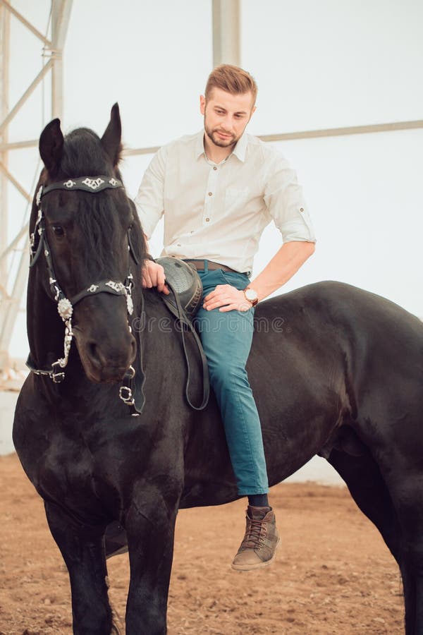 Man in a Shirt Riding on a Brown Horse Stock Image - Image of fashion,  mare: 108676137