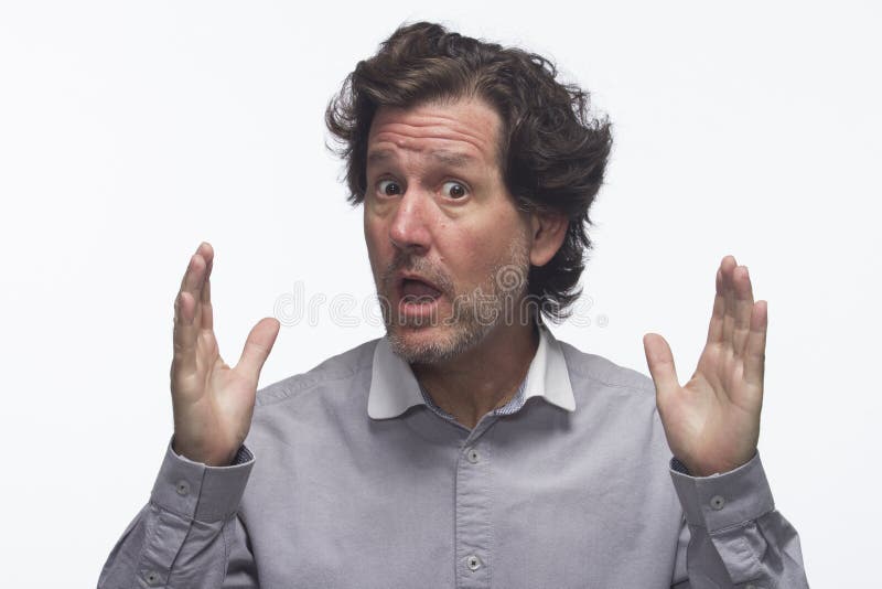 Man shocked and indicating size with hands, horizontal royalty free stock image