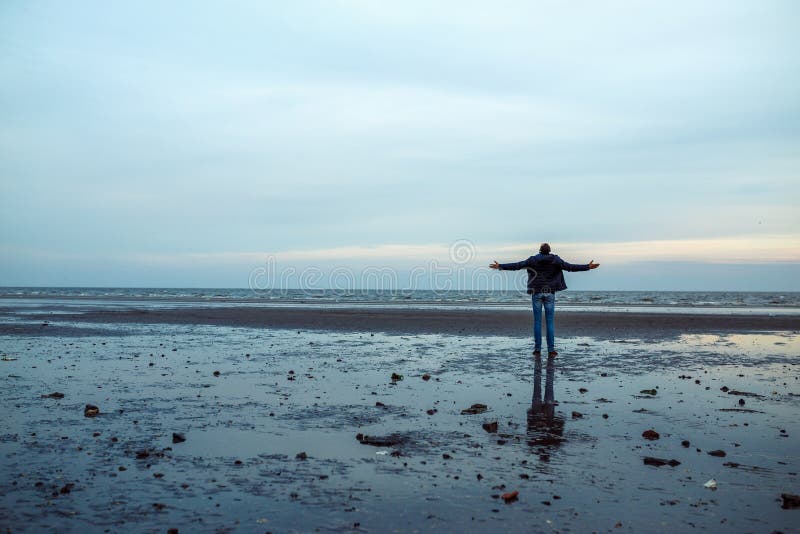 Man on the shore of Azov Sea