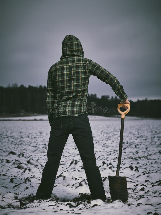 Man and shovel stock image