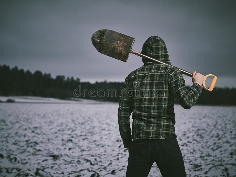 Man and shovel royalty free stock images