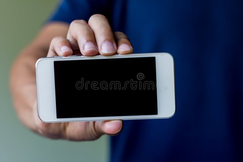 businessman show Facebook login page on his smartphone for using