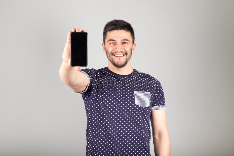 Man Showing Blank Screen of His Phone Stock Photo - Image of casual ...