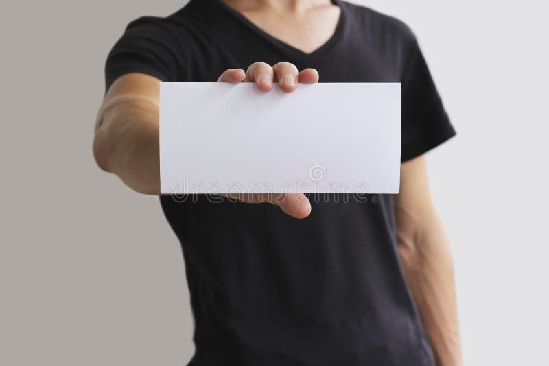 Man showing blank white flyer brochure booklet. Leaflet presentation. Pamphlet hold hands. Man show clear offset paper. Sheet temp stock images Man showing blank white flyer brochure booklet. Leaflet presentation. Pamphlet hold hands. Man show clear offset paper. Sheet temp stock images