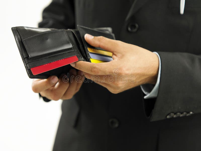 A businessman showing a empty wallet. A businessman showing a empty wallet