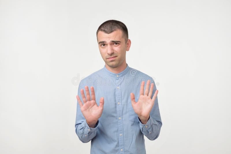 Man showing stop gesture stock photo. Image of handsome - 119306914