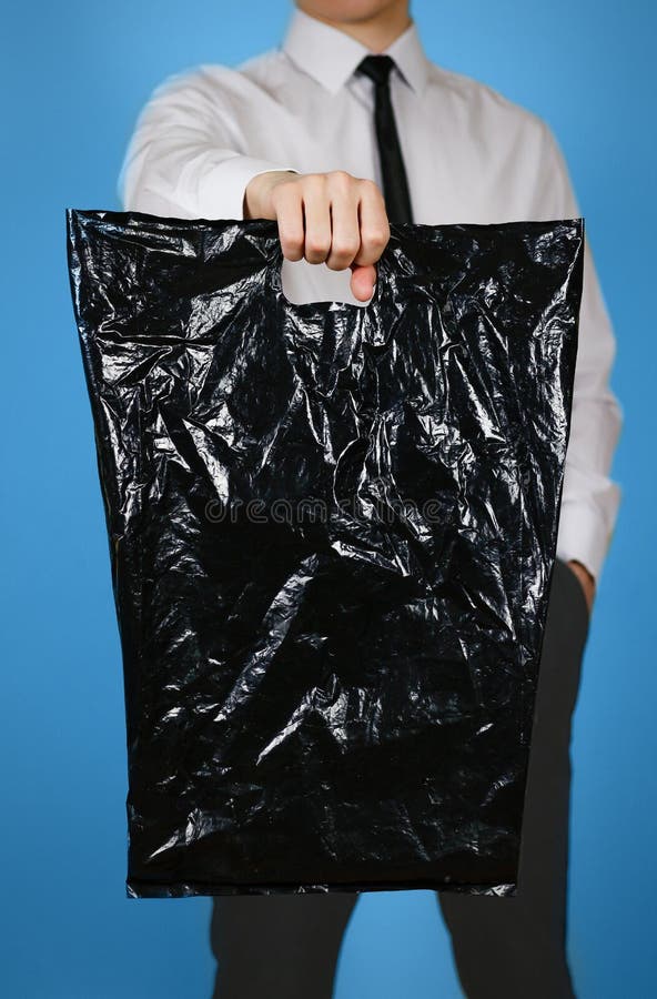 Download Man Shows Black Blank Plastic Bag Mock Up . Empty White ...