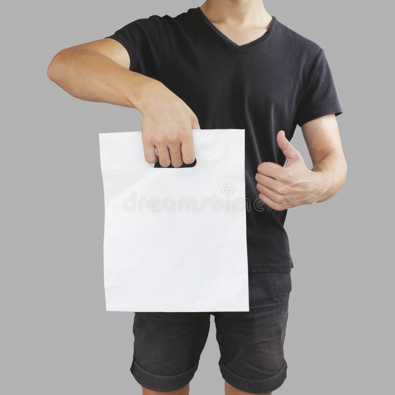 Download Man Shows Blank Plastic Bag Mock Up And Thumb Up Isolated ...