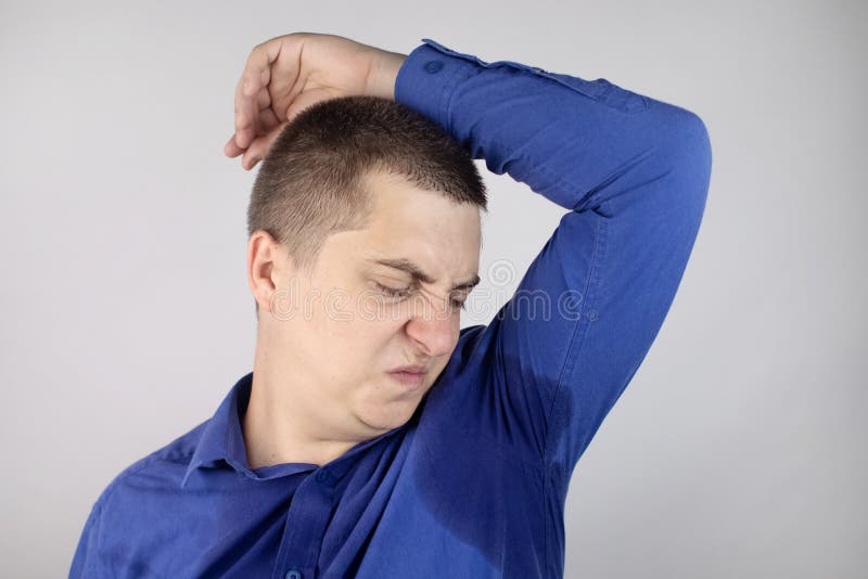 The Man Shows His Sweaty Armpits To The Camera Close Up Of Sweat Drops