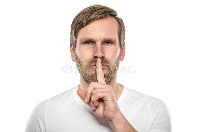 Man silent quiet gesture with finger. Isolated on white.