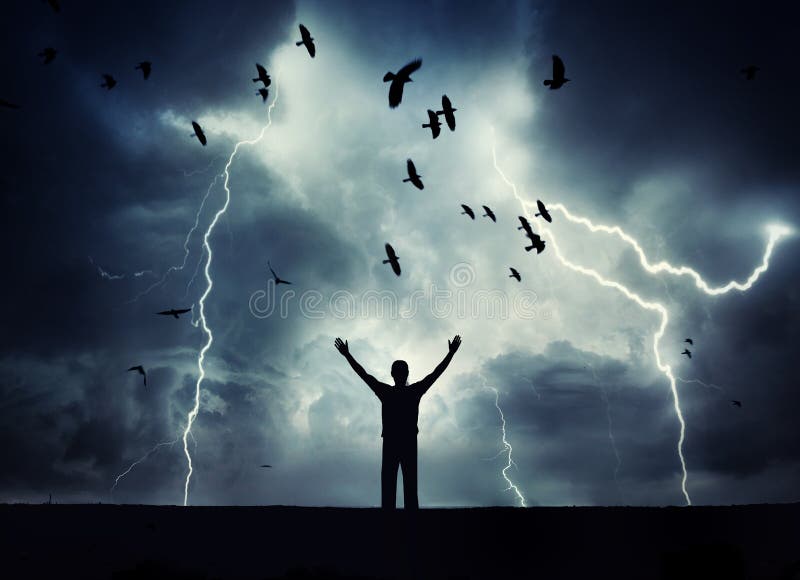 Man silhouette on a storm background. Lord of the lightning. Background on the theme royalty free stock photo Man silhouette on a storm background. Lord of the lightning. Background on the theme royalty free stock photo