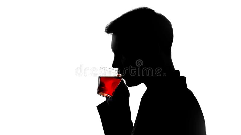 Man silhouette drinking tea, recreation after work, pH balance restore, closeup stock photography Man silhouette drinking tea, recreation after work, pH balance restore, closeup stock photography
