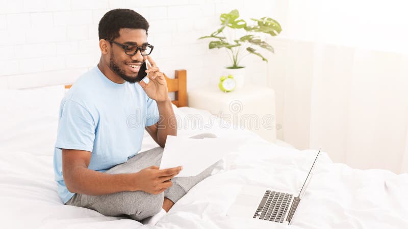 761 Young Black Man Working Office Laptop Using Phone Photos - Free &  Royalty-Free Stock Photos from Dreamstime