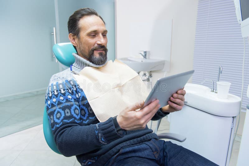 Man Sitting in Dentist Chair. Stock Image Image of healthcare, health