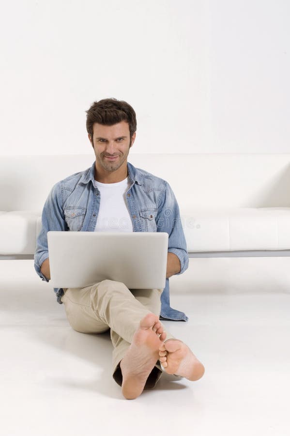 Single Man on the Couch Watching TV Stock Photo - Image of gesture ...