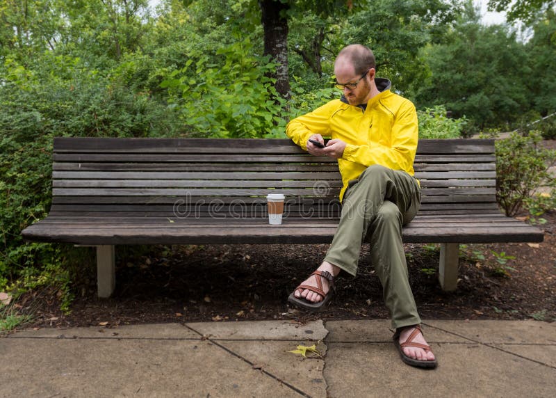 Old Man Sitting On Park Bench