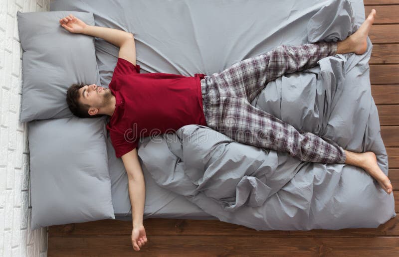 Man Sleeping in Bed at Home Stock Photo - Image of homely, comfortable ...