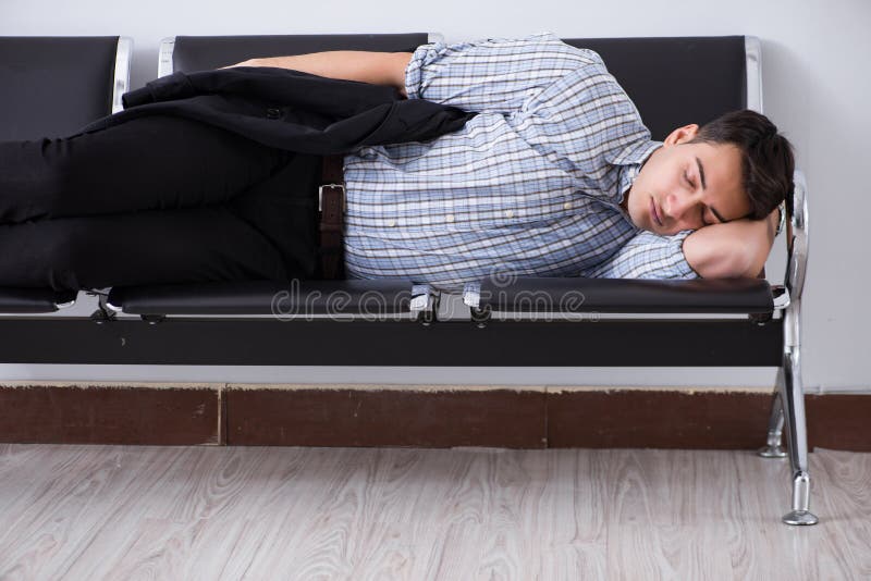 Man Sleeping on the Chairs in Airport Stock Photo Image of airline