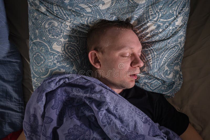 Man is Sleeping in His Bed at Night and is Snoring Stock Image Image
