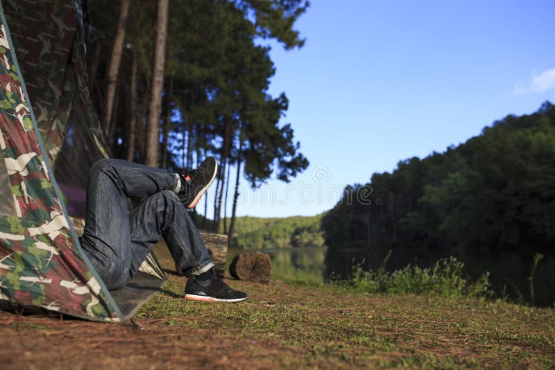 Man Sleeping in the Tent beside the Lake Stock Photo Image of