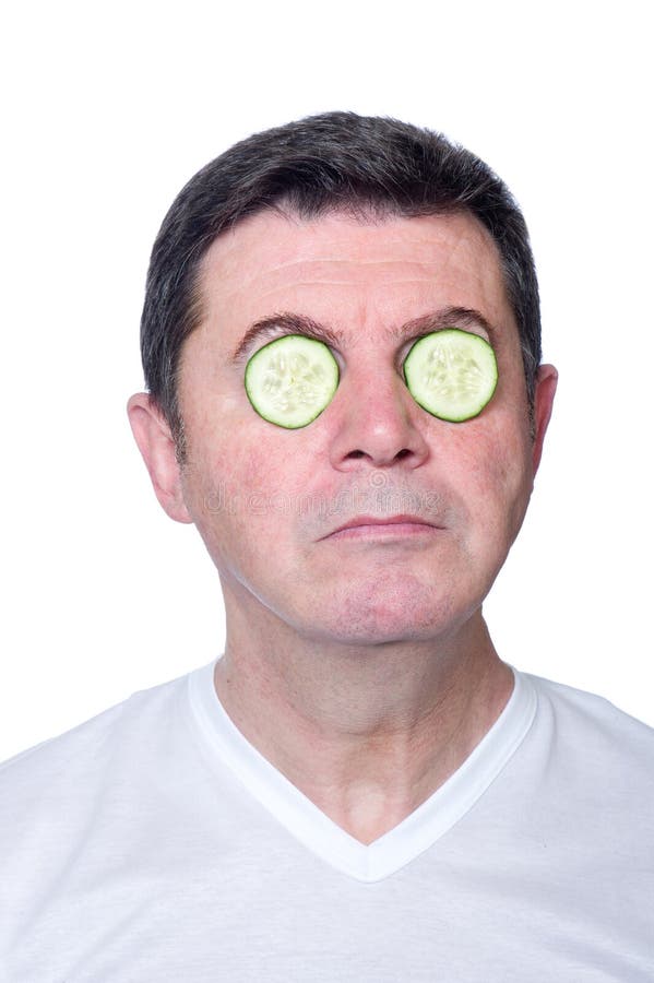 Man with Slice Cucumber Over Eyes Stock Photo Image of caucasian
