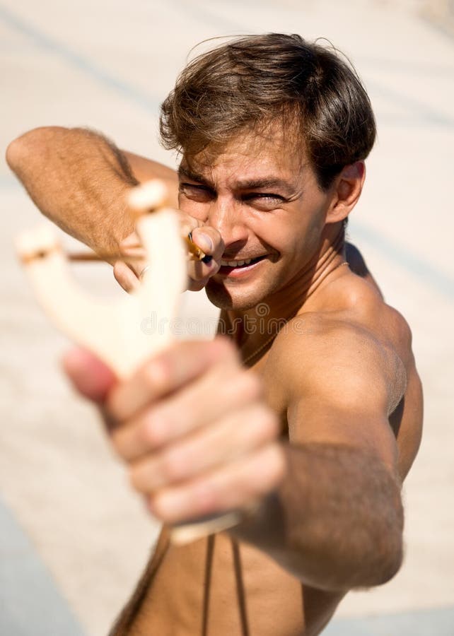 Man with slingshot stock photo. Image of alone, caucasian 21477976