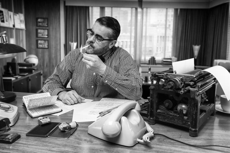 Man Smoking A Cigarette In The Office Stock Image - Image Of Cigarette