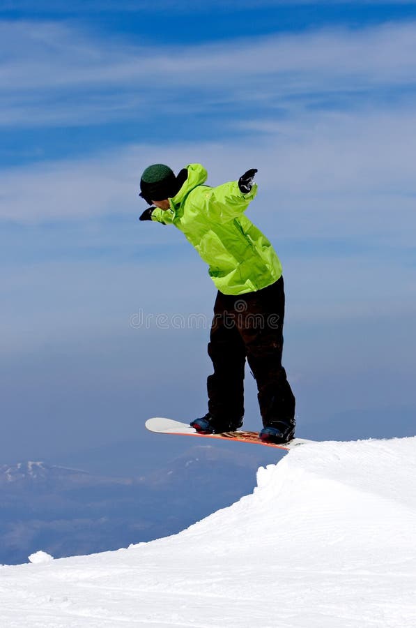 Man Snowboarding on Slopes of Pradollano Ski Resort in Spain Stock