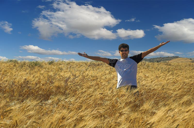 Man standing in crop field stock image. Image of grain 9408193