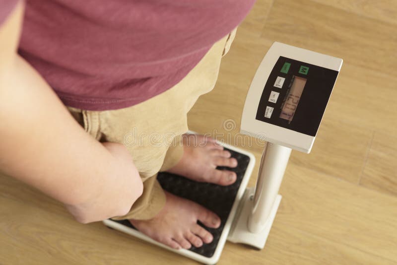 Man Standing on Digital Scales Cropped Waist Down Stock Image Image