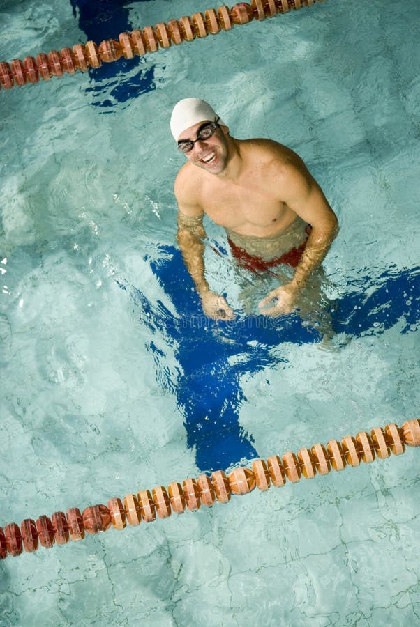 Man Standing in Pool