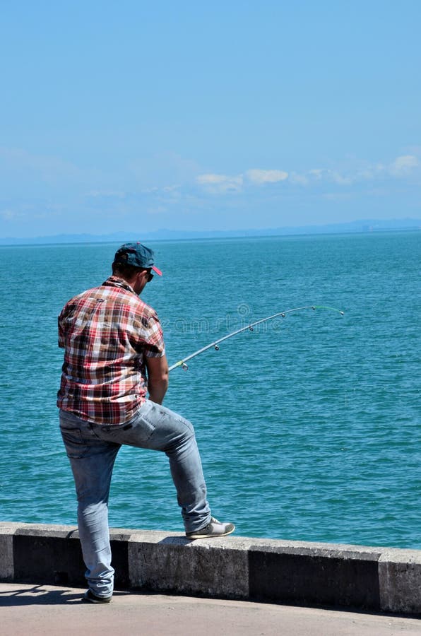 Fishing Pole Looking Over Water Stock Photos - Free & Royalty-Free