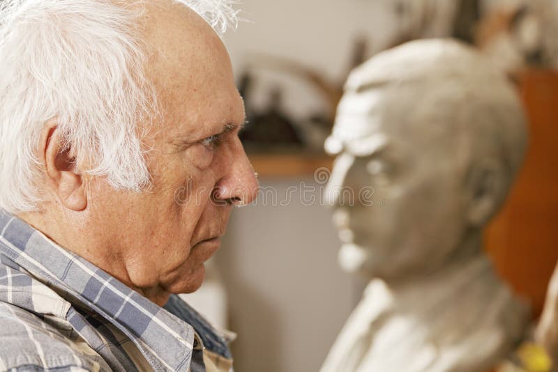 Man and statue royalty free stock image