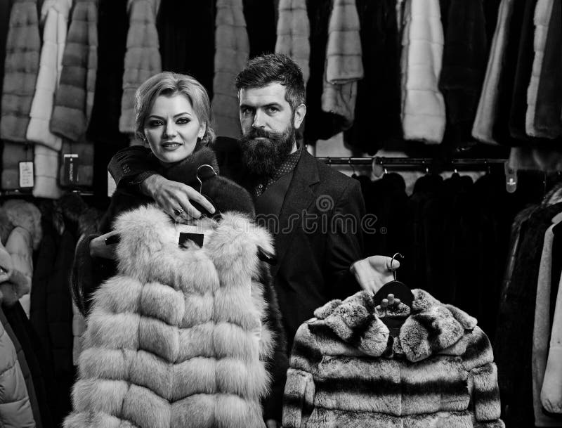 Man and Woman with Coats in Fur Shop. Stock Image - Image of coats ...