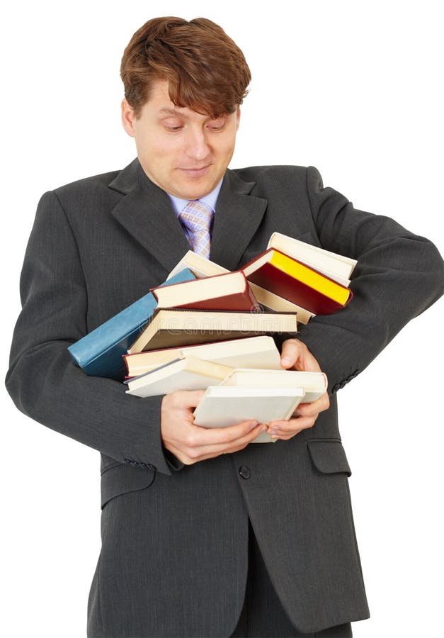 Man - student hold heap of books and textbooks