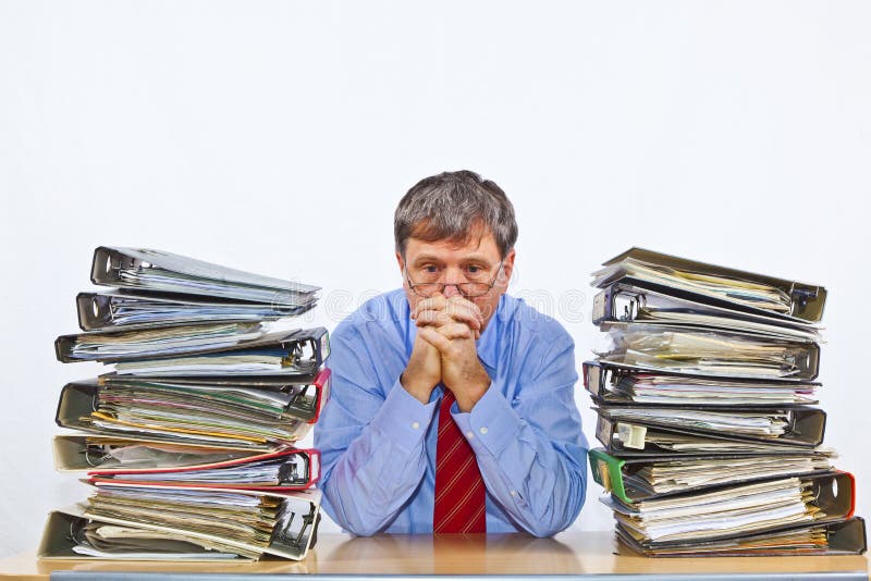 Man studies folder with files at