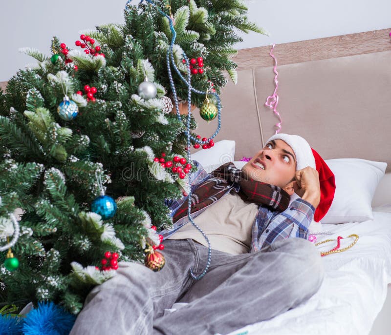 Man Suffering Hangover after Christmas Party Stock Image Image of