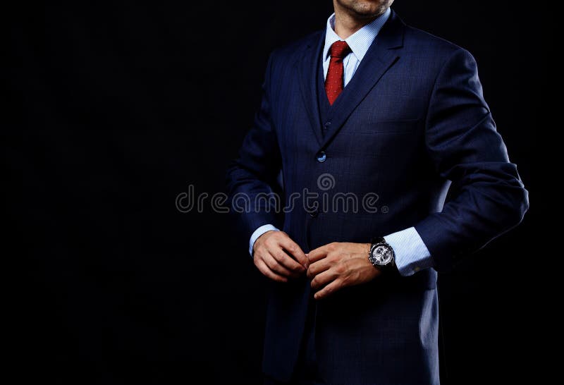 Man in suit on a black background
