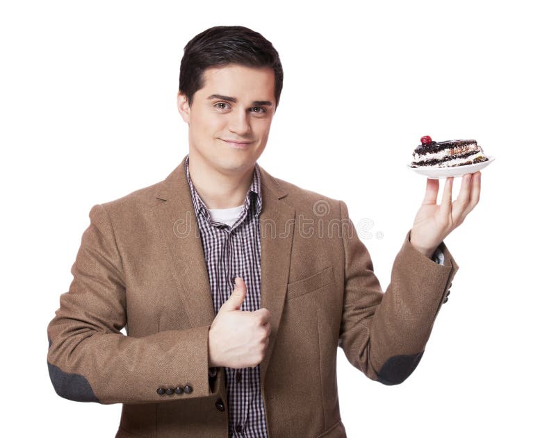 Man in suit holds cake, isolated on white